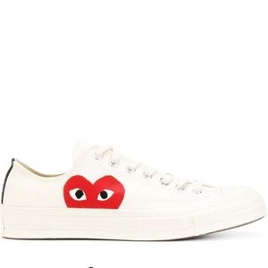Comme des garçon play white low top converse.